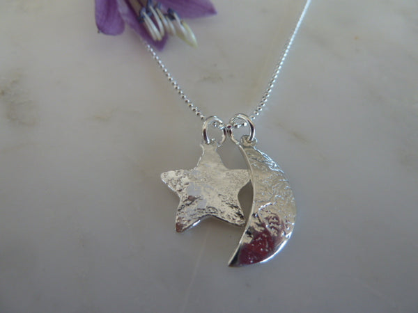 silver moon/star pendant