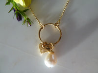 gold circle/heart with fresh water pearl pendant