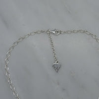 three silver circle pendant