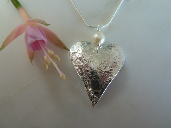large silver heart pendant