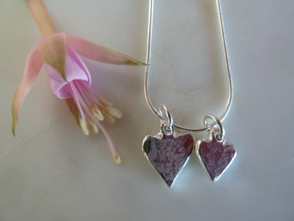 large & small silver heart pendant