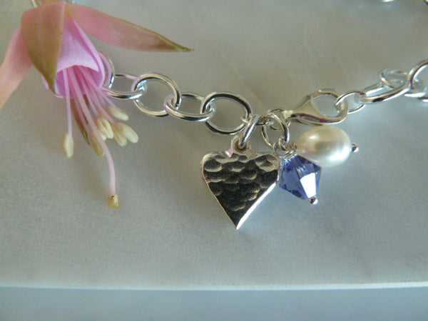 silver oval link solid heart charm bracelet