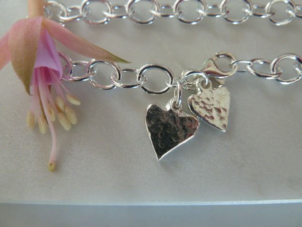 silver oval link solid large & small heart charms bracelet