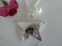 medium silver star pendant