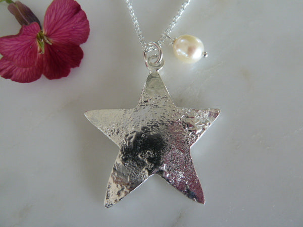 medium silver star pendant