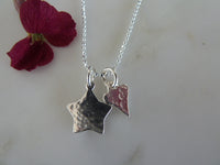 small silver star & heart pendant