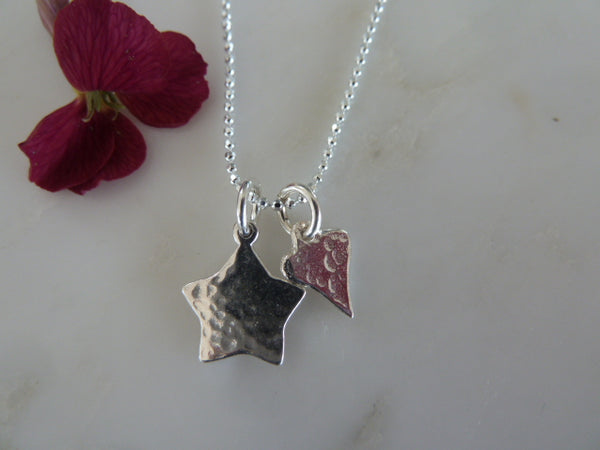 small silver star & heart pendant