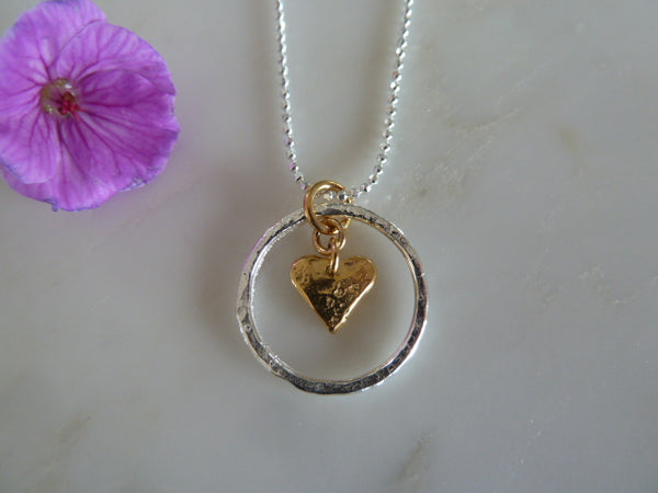 silver circle & gold heart pendant