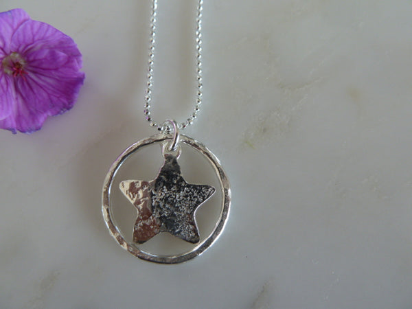silver circle & star pendant