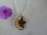 silver circle & gold star pendant