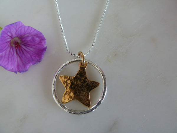 silver circle & gold star pendant