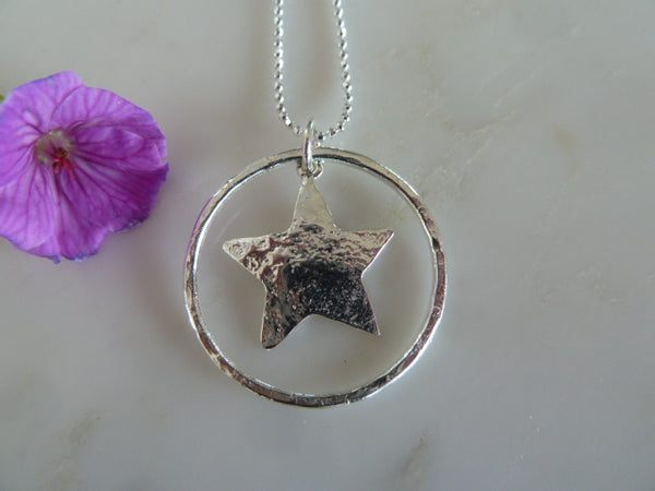 silver large circle & star pendant