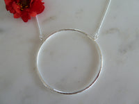 large silver circle necklace
