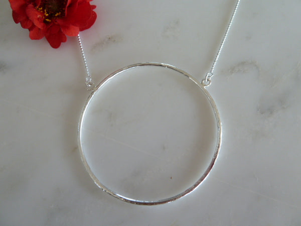 large silver circle necklace