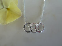 silver textured three circle pendant