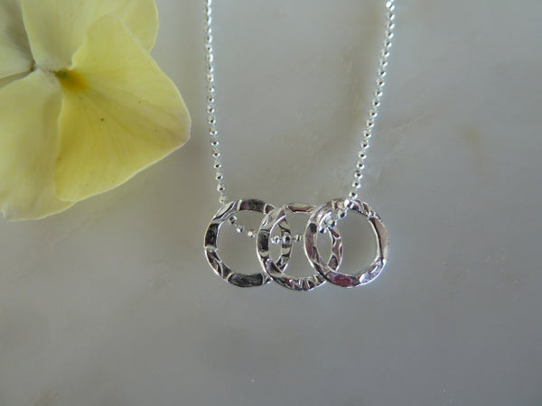 silver textured three circle pendant
