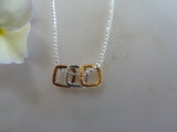 silver, gold & rose gold three square pendant