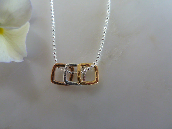 silver, gold & rose gold three square pendant