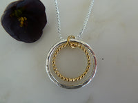 large circle gold dot pendant