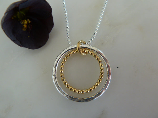 large circle gold dot pendant
