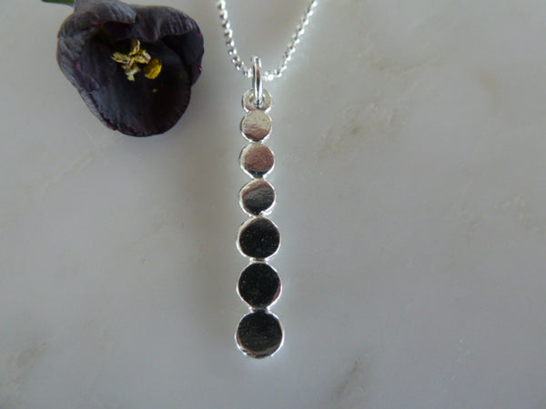 silver six dot pendant