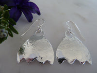 silver wavy bottom earrings