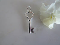 silver key pendant