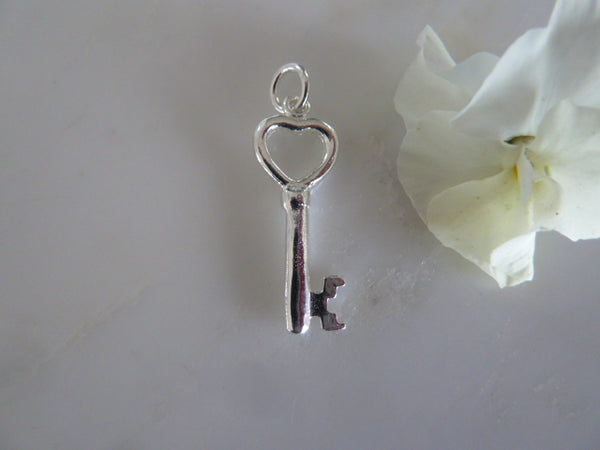 silver key pendant