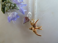 gold swallow & heart pendant